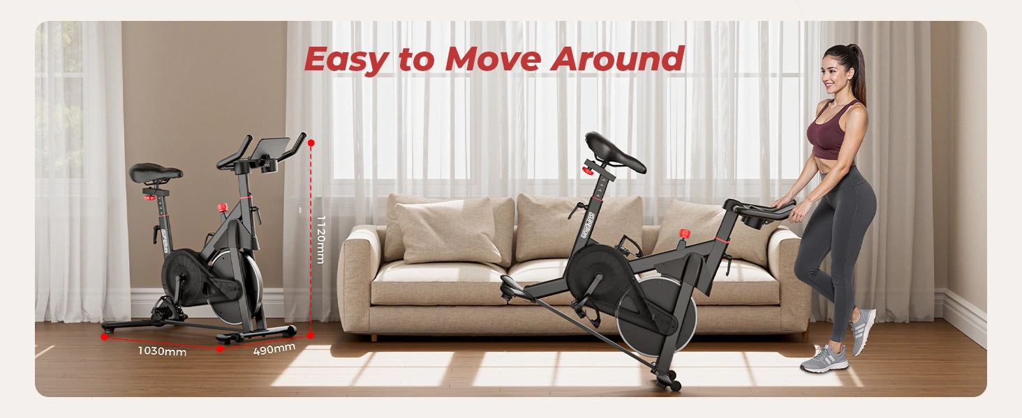 Exercise bike with a woman using it in a living room setting, emphasizing ease of movement.